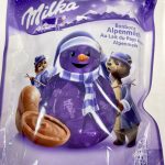 Шоколадні цукерки зі шматочками карамелі та мигдалю Milka Bonbons Alpenmilch Daim 86г Швейцарія