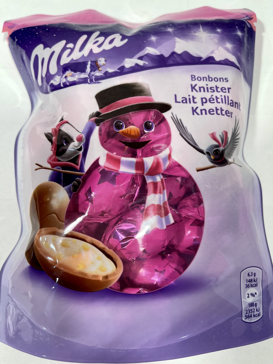 Шоколадні цукерки Milka Bonbons Knister Lait petillant Knetter 86 р Швейцарія