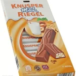 Шоколад молочний зі шматочками фундуку та пластівцями Chateau Knusper Milch Riegel 200г Німеччина