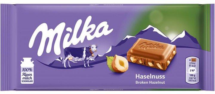 Шоколад молочний із лісовим горіхом Milka Hazelnuts Швейцарія 100 г