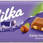 Шоколад молочний з цілим фундуком Milka Ganze Hazelnuts Швейцарія 100 г