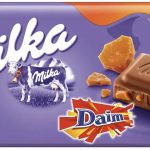 Шоколад молочний з карамеллю і мигдалем Milka Ganze Hazelnuts Швейцарія 100 г