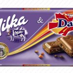 Шоколад молочний з карамеллю і мигдалем Milka Ganze Hazelnuts Швейцарія 100 г