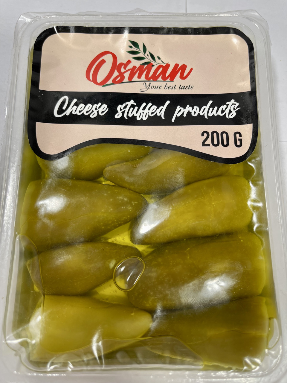 Оливки зелені фаршировані сиром у соняшниковій олії Osman Chees Stuffed products 200 г Туреччина