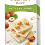 Шоколад білий карамелізований із суцільним фундуком Heidi Golden Hazelnuts 100 г Румунія