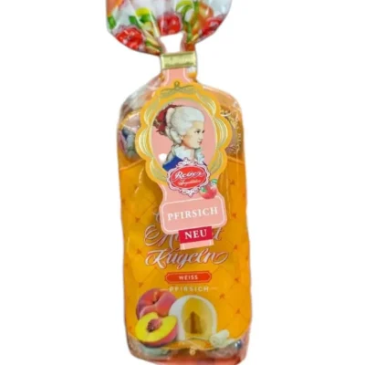 Цукерки марципанові персик у білому шоколаді Mozart-Kugel Reber Німеччина 160г