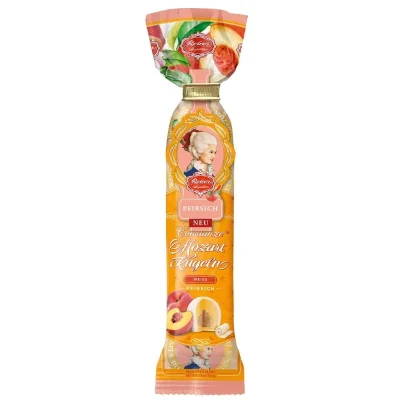 Цукерки марципанові персик у білому шоколаді Mozart-Kugel Reber Німеччина 100 г